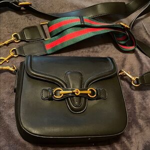 Black Leather Crossbody Bag with Gold Accents